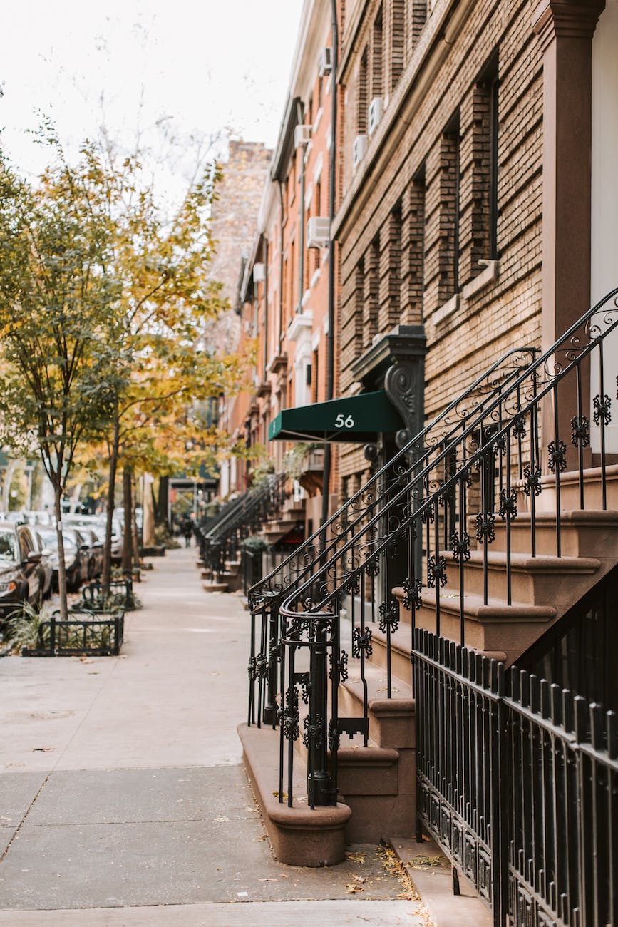 apartment building with a staircase on the sidewall