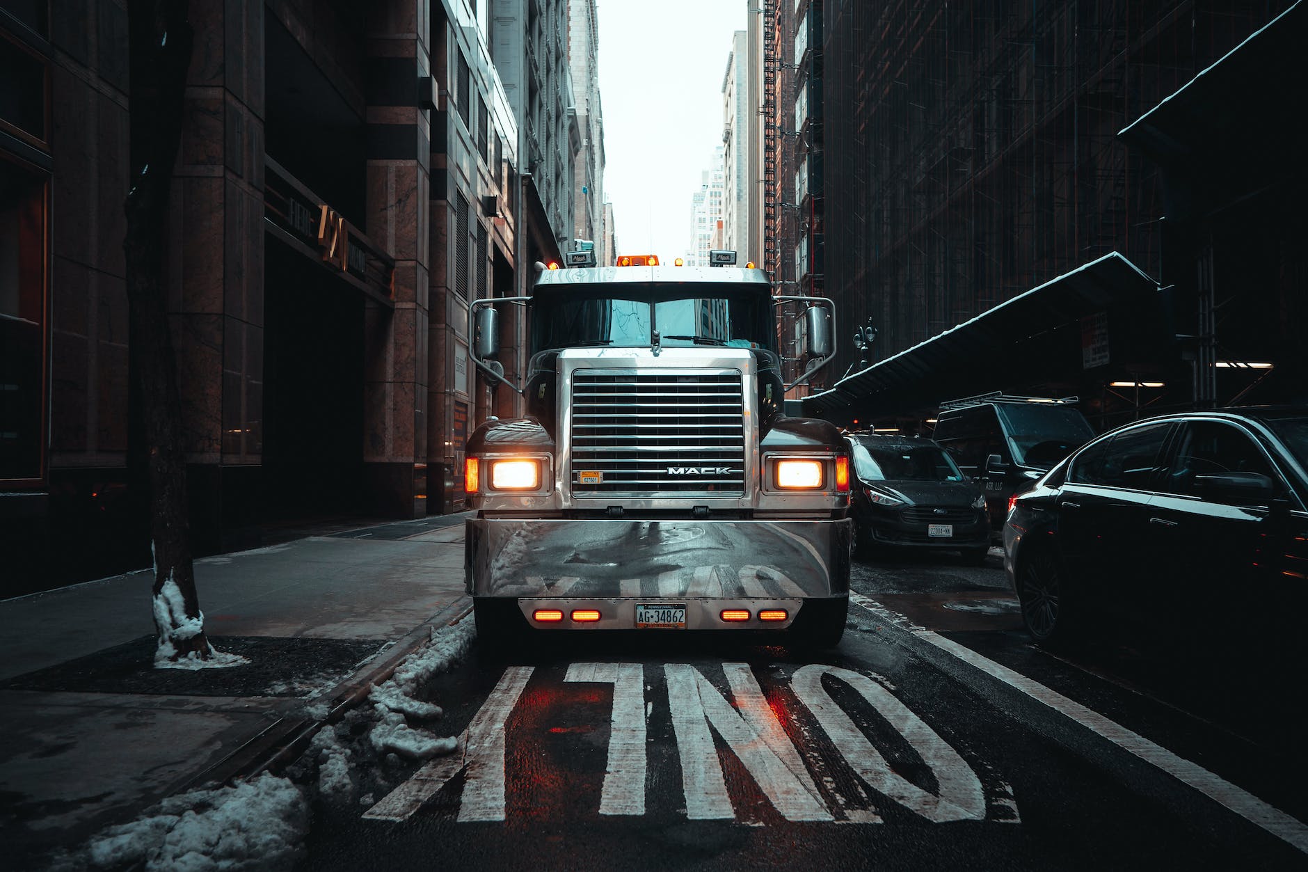 truck in a narrow alley in new york